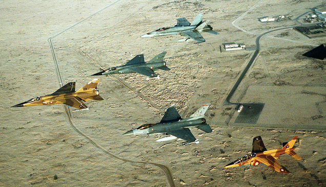 The true multinational effort of Desert Shield/Desert Storm is illustrated in this formation flight. From left to right: a Qatari Mirage F1, a French Mirage F1, a U.S. Air Force F-16C Fighting Falcon, a Canadian CF-18A Hornet and a Qatari Alpha Jet. (US Air Force)